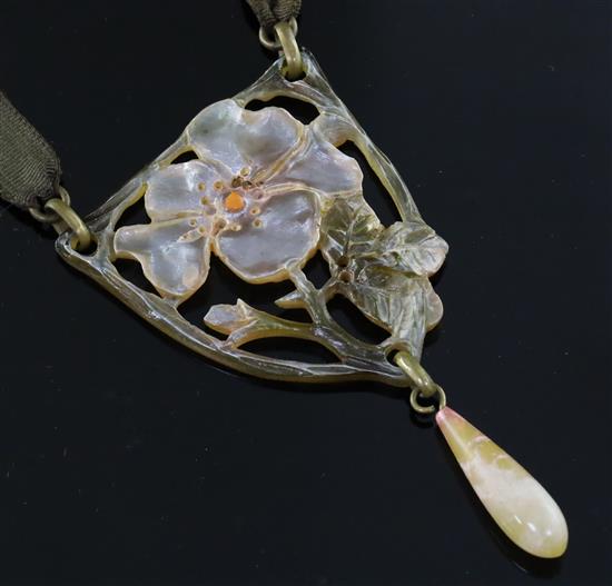 An early 20th century French pierced and carved horn flower drop pendant by Georges Pierre, pendant 88mm.